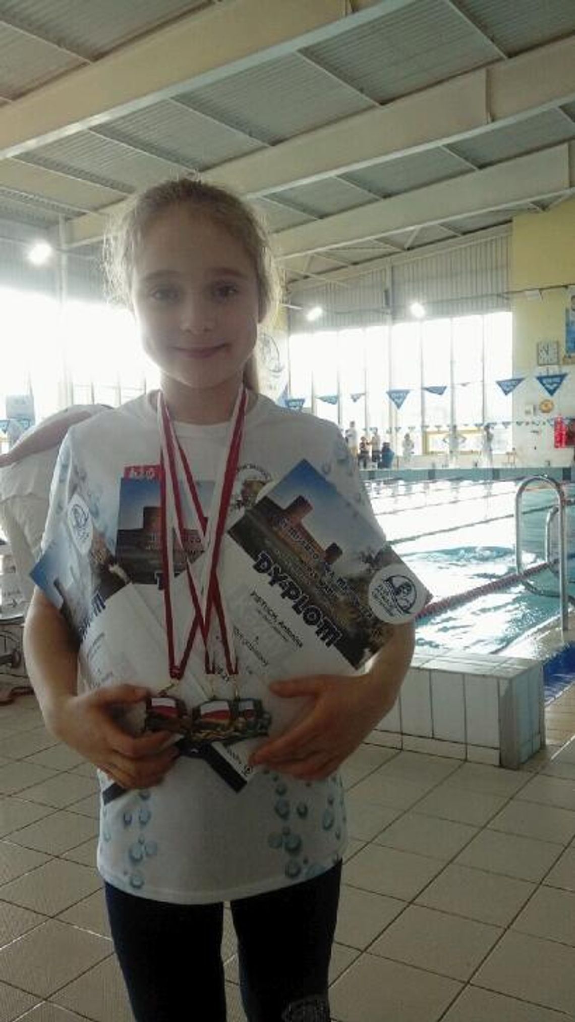 PŁYWANIE. Osiem razy na podium